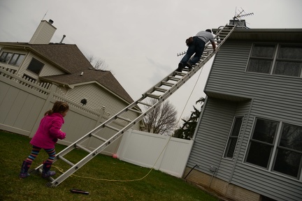 Greta holding the ladder